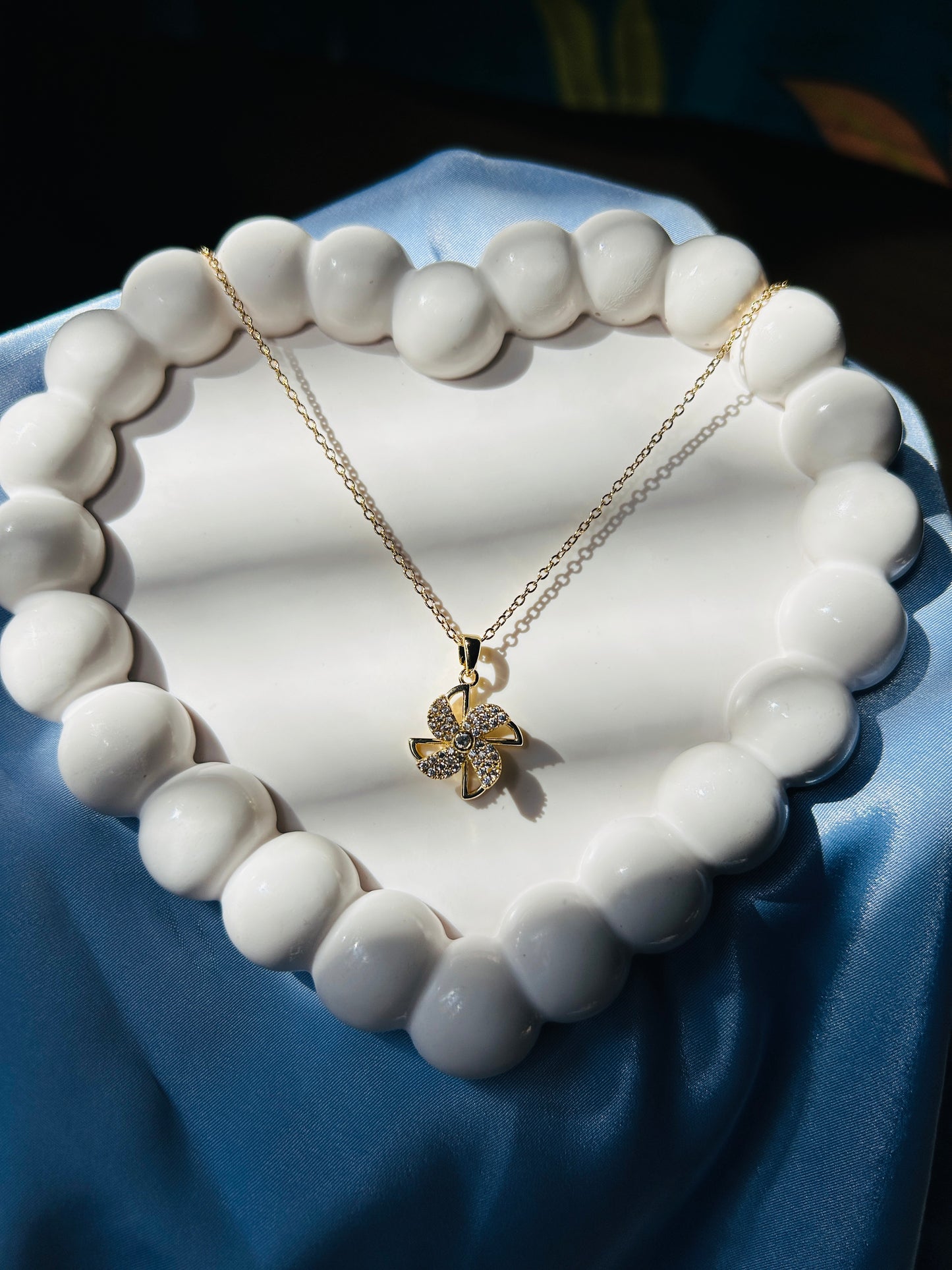 Revolving Diamond Flower Pendant