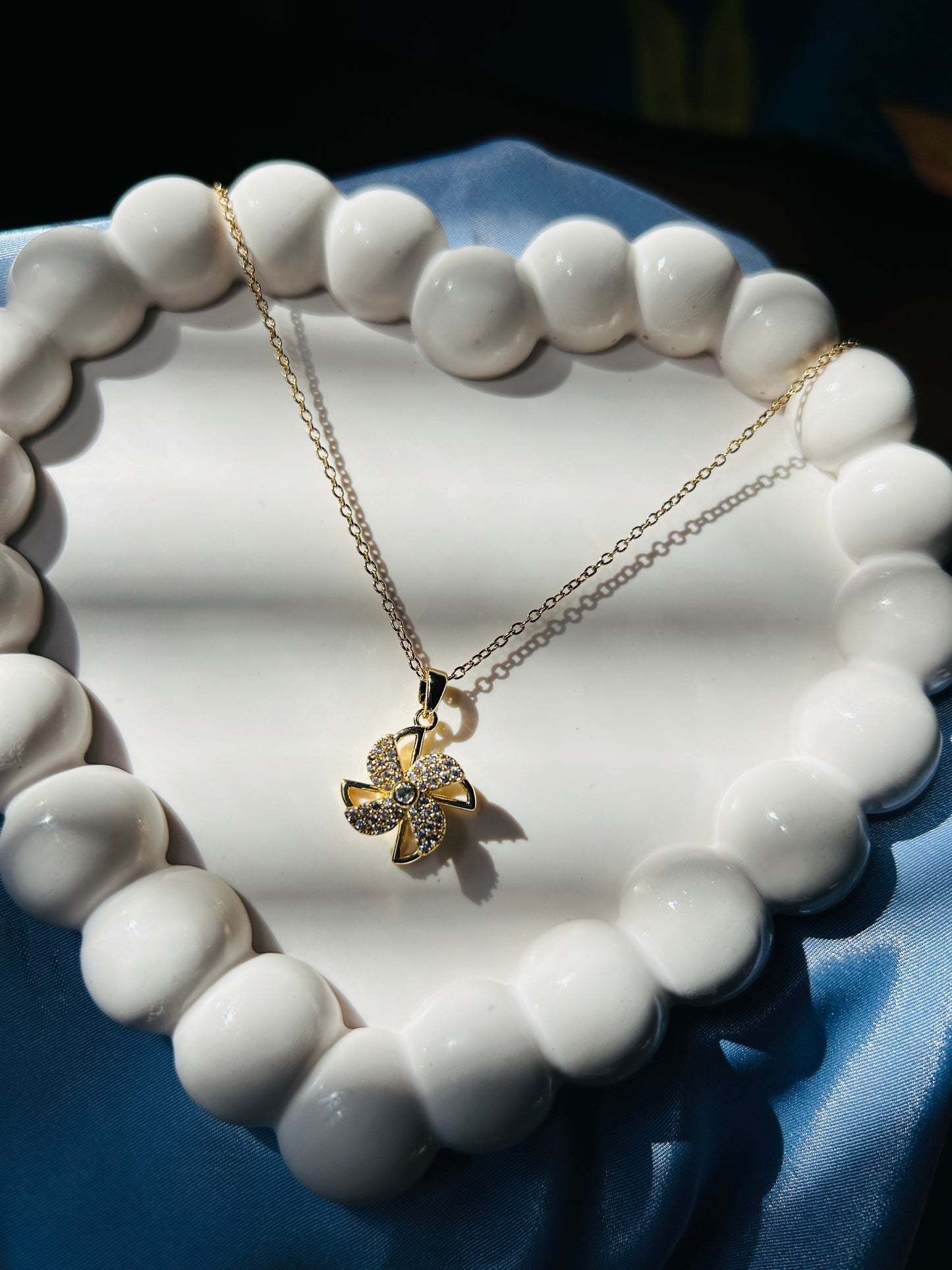Revolving Diamond Flower Pendant