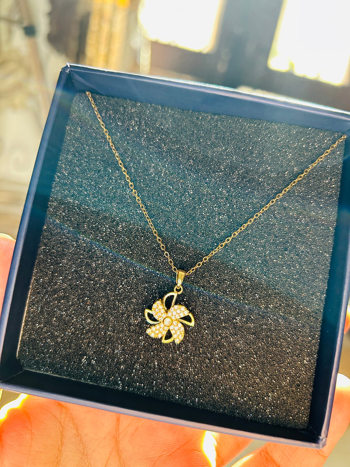 Revolving Diamond Flower Pendant